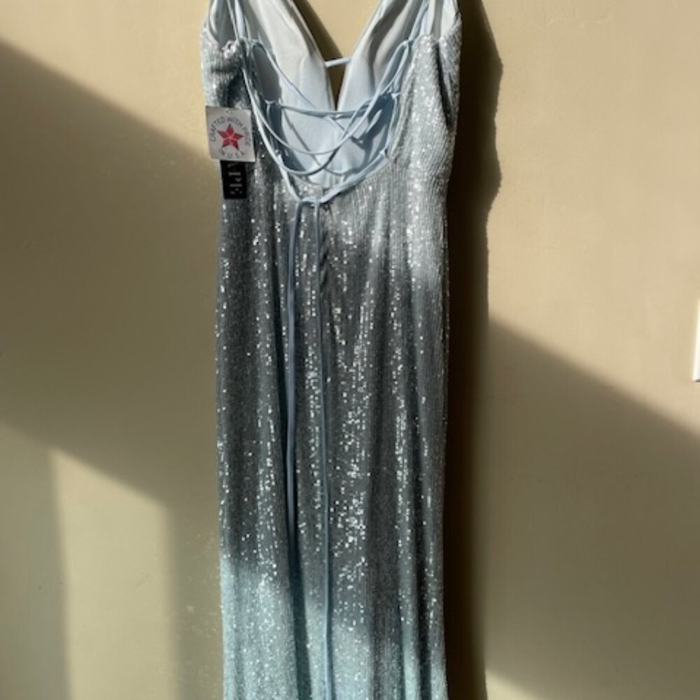 A Shiny blue and silver dress for prom